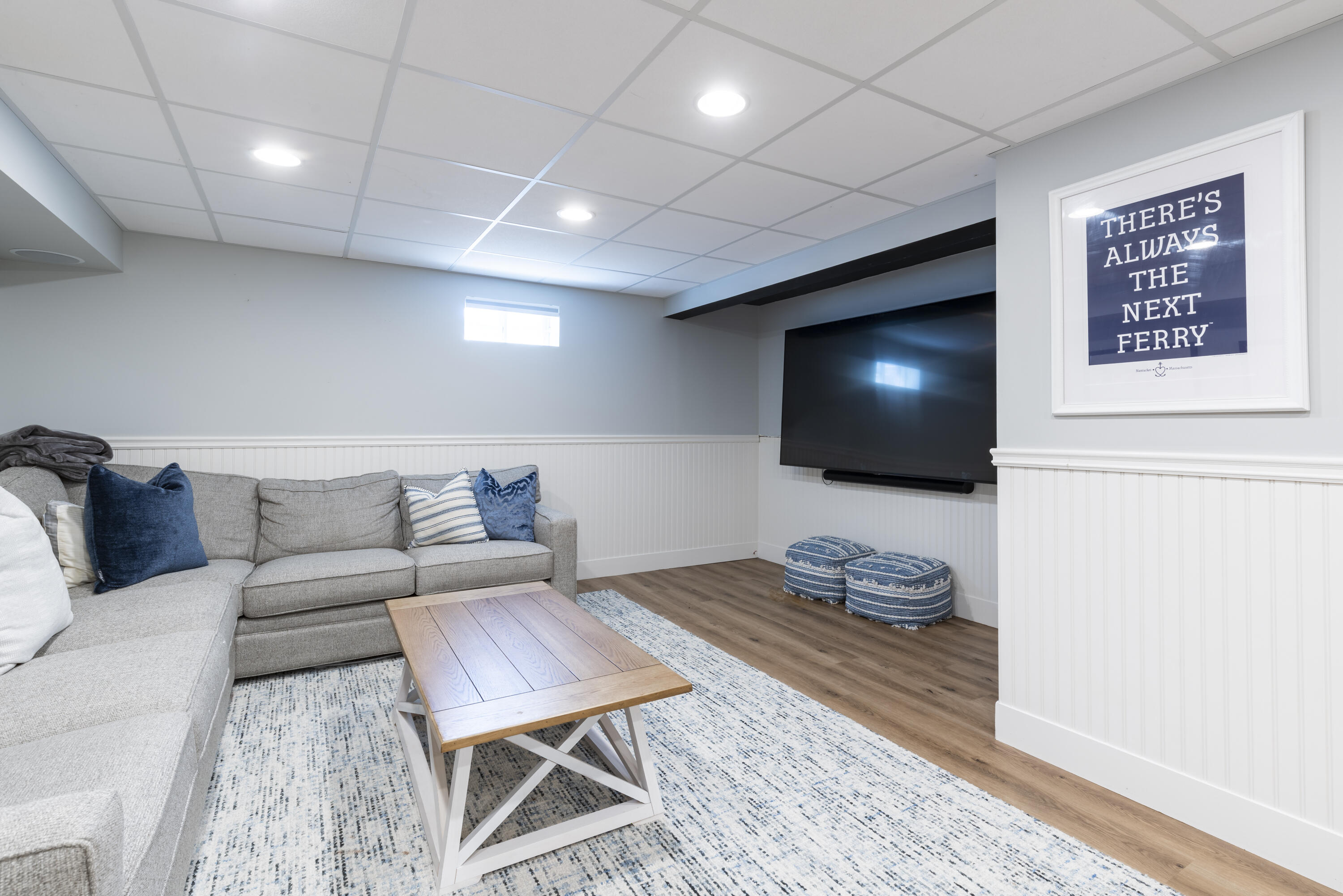 331 Riverview Drive Chatham, MA 02633 - Photo 43 of 50 a living room with furniture and a flat screen tv