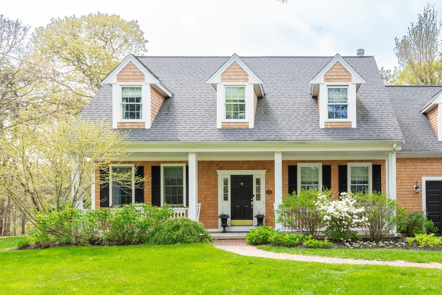 331 Riverview Drive Chatham, MA 02633 - Photo 5 of 50 front view of a house with a yard