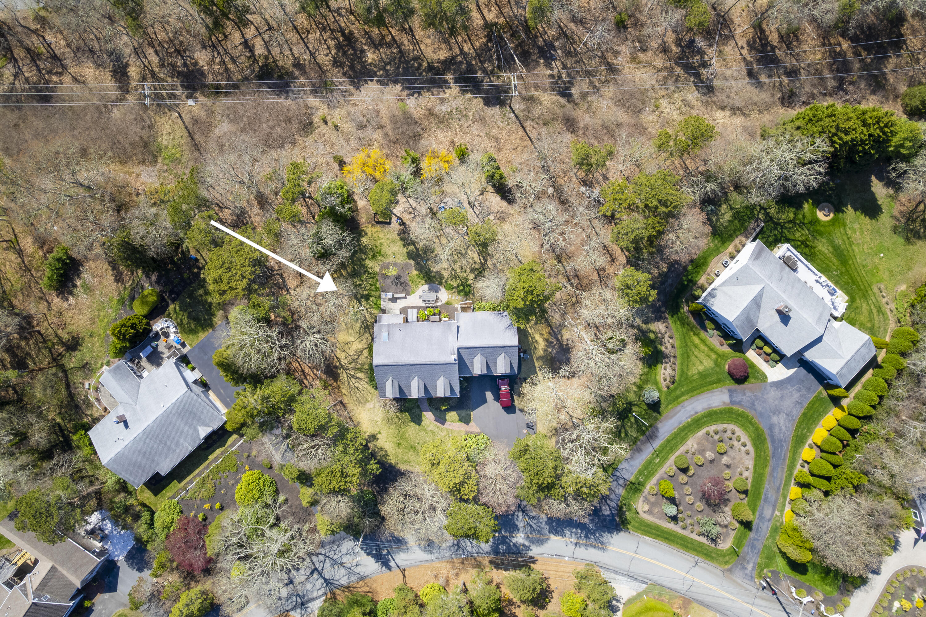 331 Riverview Drive Chatham, MA 02633 - Photo 8 of 50 an aerial view of a house with a yard and lake view
