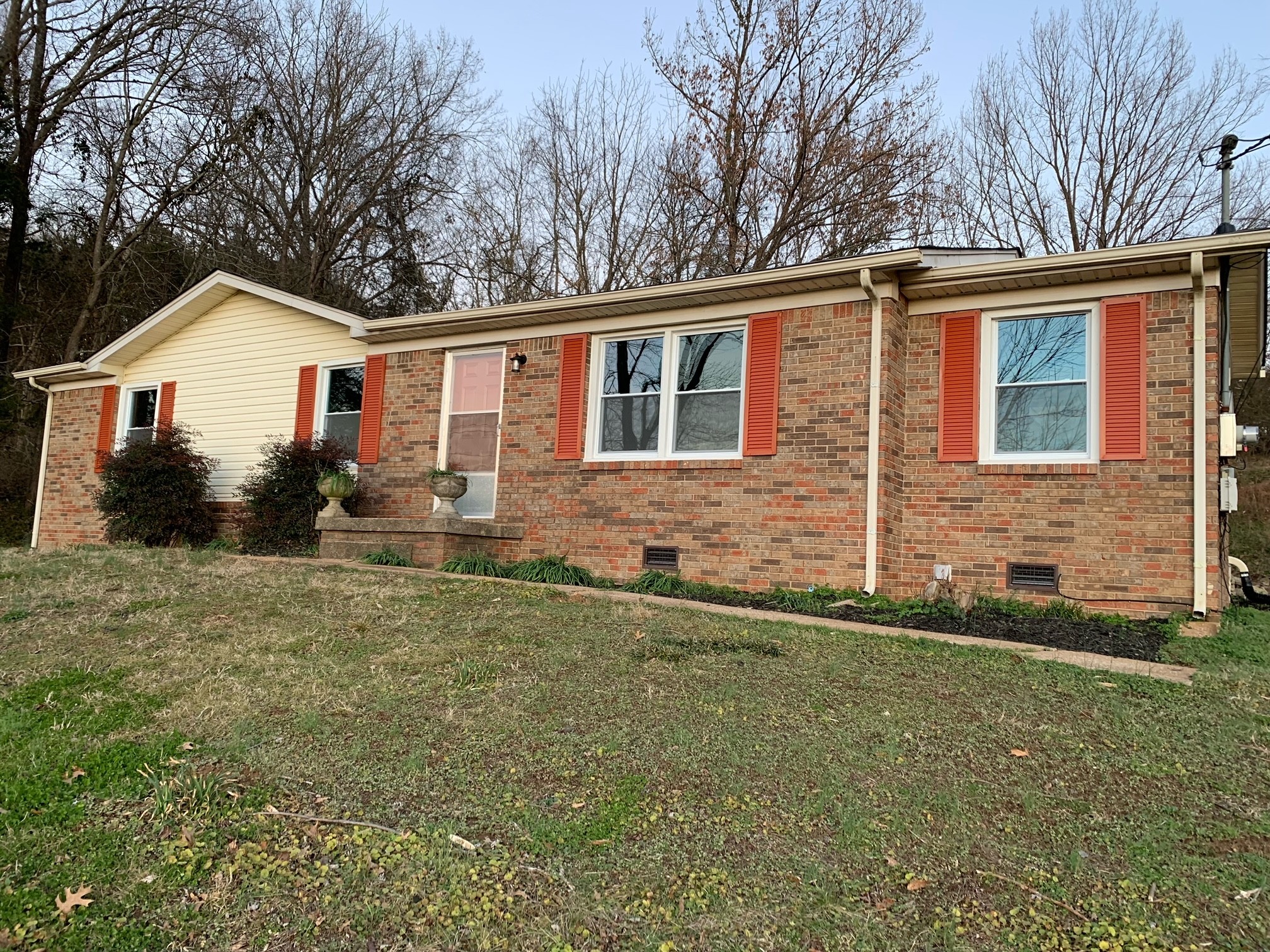 455 Bethel Road Pulaski, TN 38478 - Photo 1 of 23 a front view of house with yard and trees in the background
