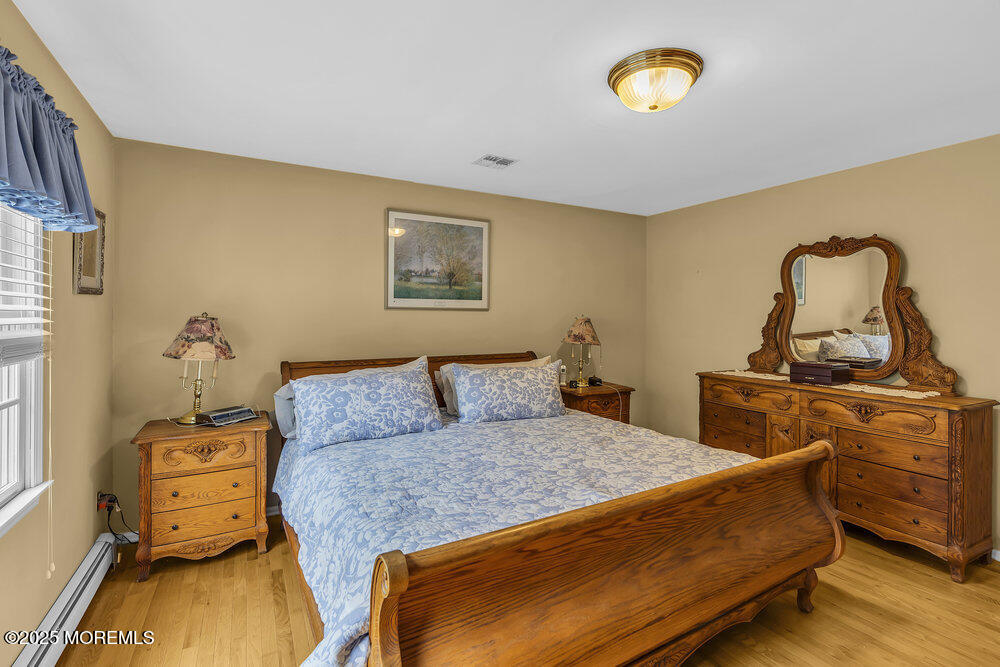 627 Reed Road Jackson, NJ 08527 - Photo 24 of 44 a living room with furniture and a window