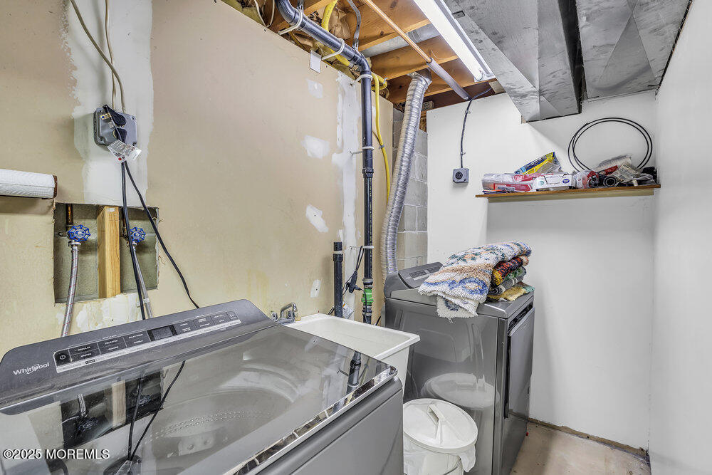 627 Reed Road Jackson, NJ 08527 - Photo 29 of 44 a utility room with a stove a sink and dishwasher