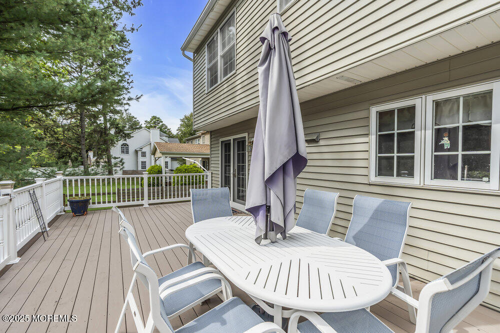 627 Reed Road Jackson, NJ 08527 - Photo 30 of 44 a view of a deck with furniture