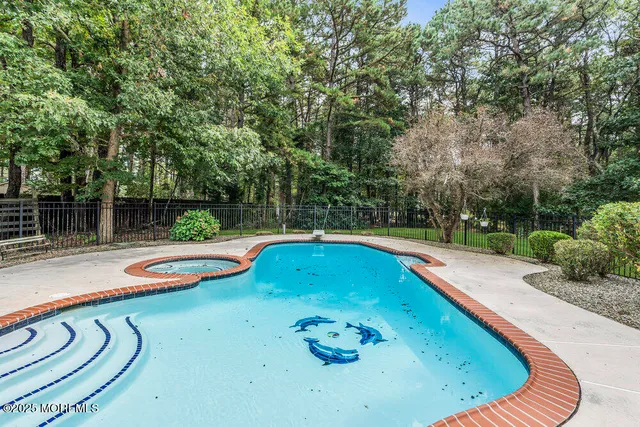 a view of a park with large trees