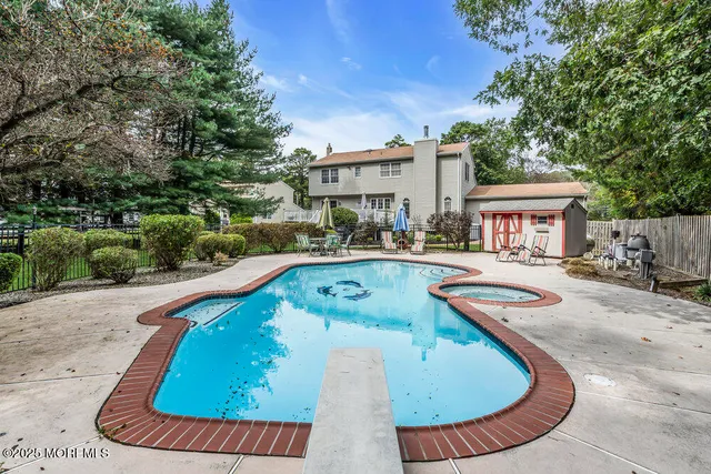 a view of outdoor space yard swimming pool and porch