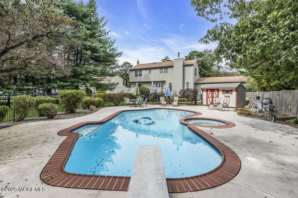 627 Reed Road Jackson, NJ 08527 - Photo 4 of 44 a view of outdoor space yard swimming pool and porch
