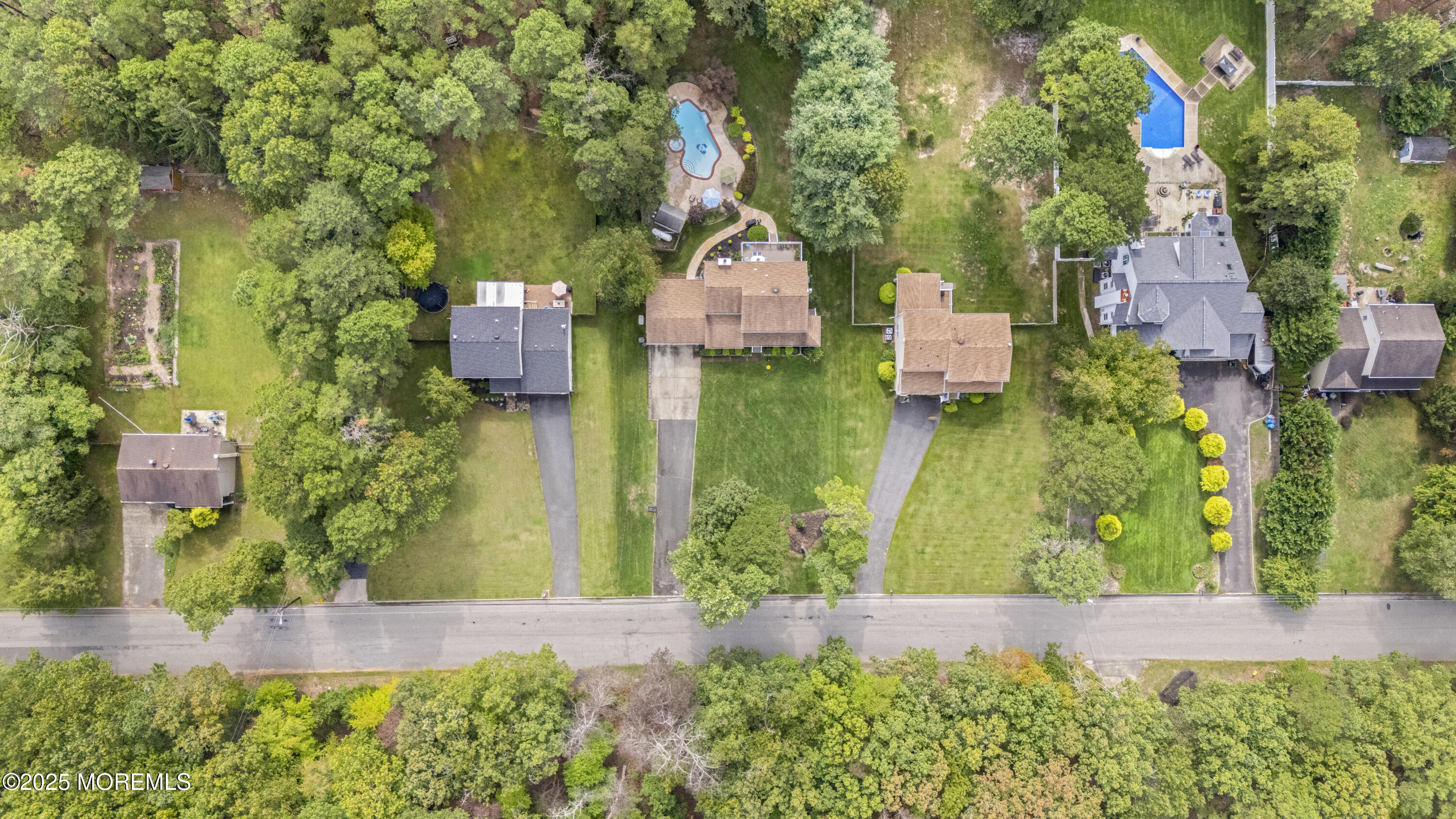 627 Reed Road Jackson, NJ 08527 - Photo 44 of 44 an aerial view of residential house with outdoor space and trees all around