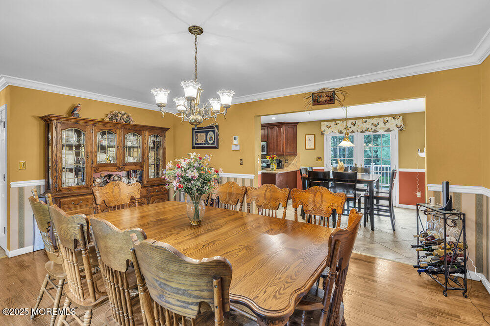 627 Reed Road Jackson, NJ 08527 - Photo 7 of 44 a view of a dining room with furniture window and outside view