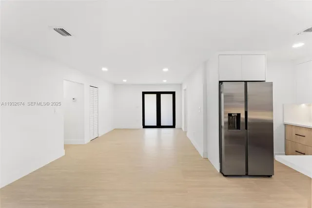 a view of an empty room with window