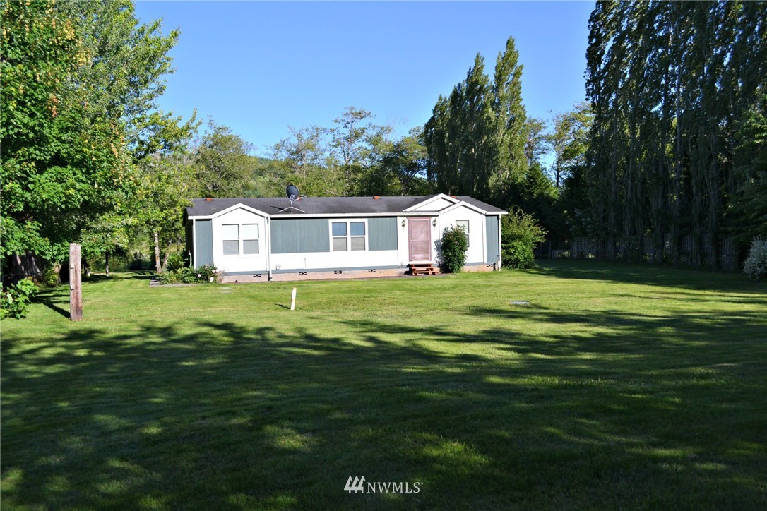1462 North Fork Road Chehalis, WA 98532 - Photo 1 of 23 a house view with a play ground in front of it