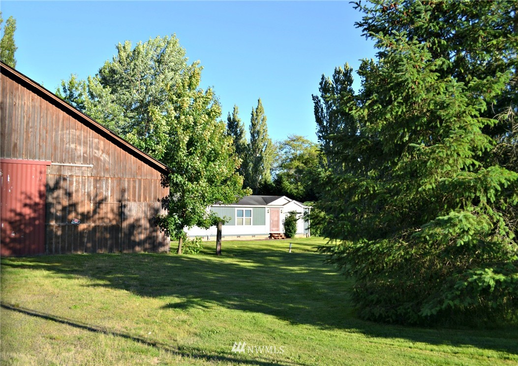 1462 North Fork Road Chehalis, WA 98532 - Photo 2 of 23 a house view with a garden space