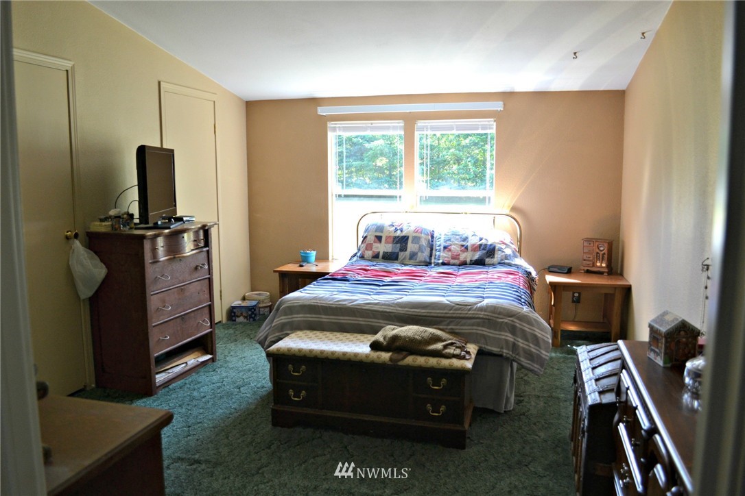 1462 North Fork Road Chehalis, WA 98532 - Photo 10 of 23 a bedroom with a bed and furniture