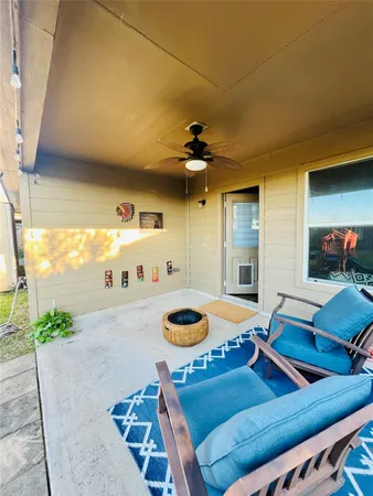a living room with furniture and a table