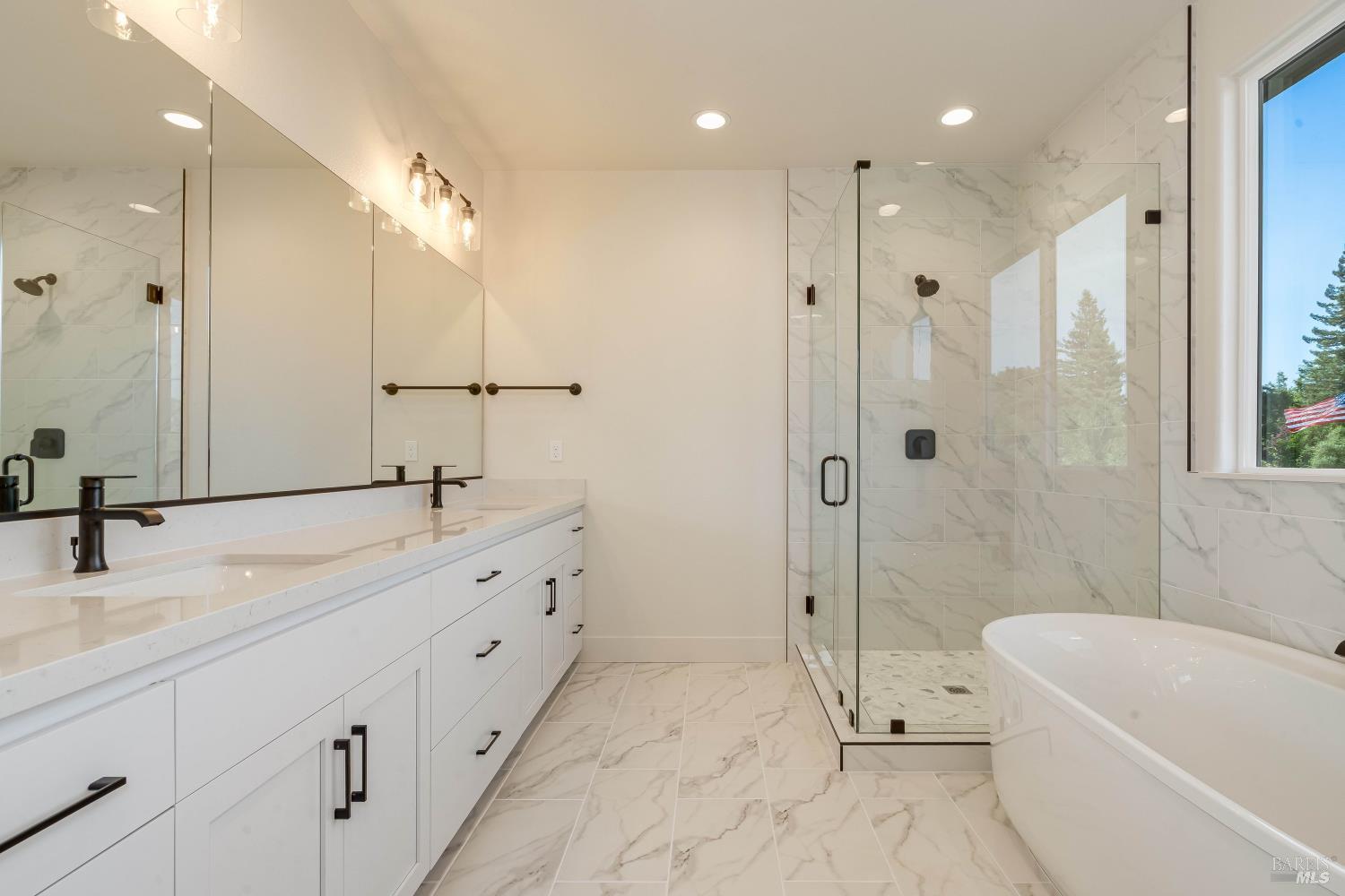 3461 Ruston Lane Napa, CA 94558 - Photo 12 of 22 a bathroom with a tub a sink shower and mirror