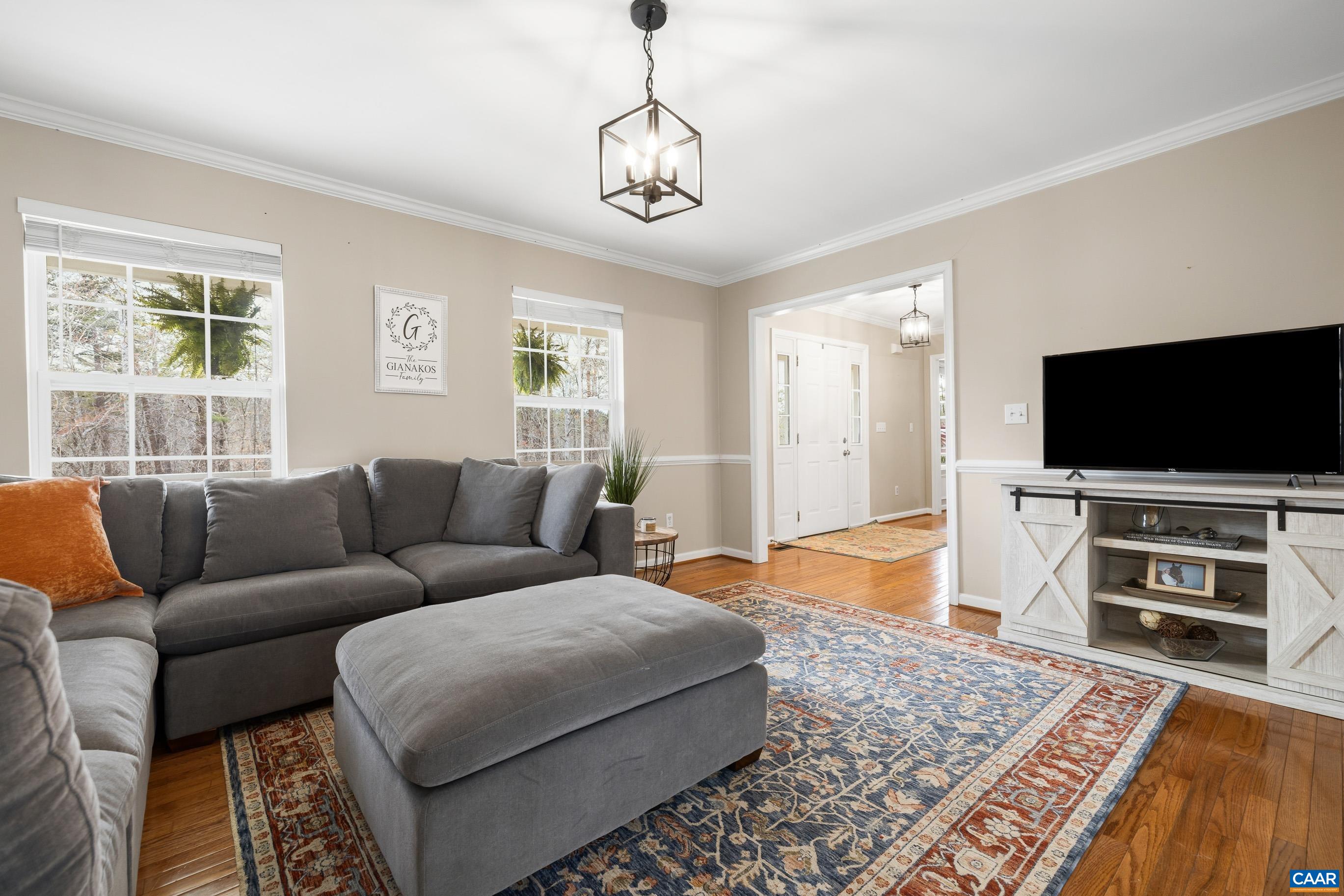 17 Hopi Way Palmyra, VA 22963 - Photo 10 of 36 a living room with furniture and a flat screen tv