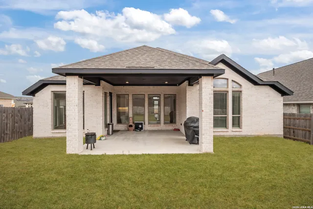 a front view of a house with patio