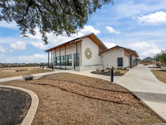 a house view with a backyard space