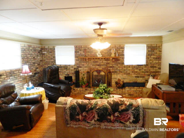 5008 Aldebaran Way West Mobile, AL 36693 - Photo 3 of 13 Large family room with beautiful custom built brick fireplace