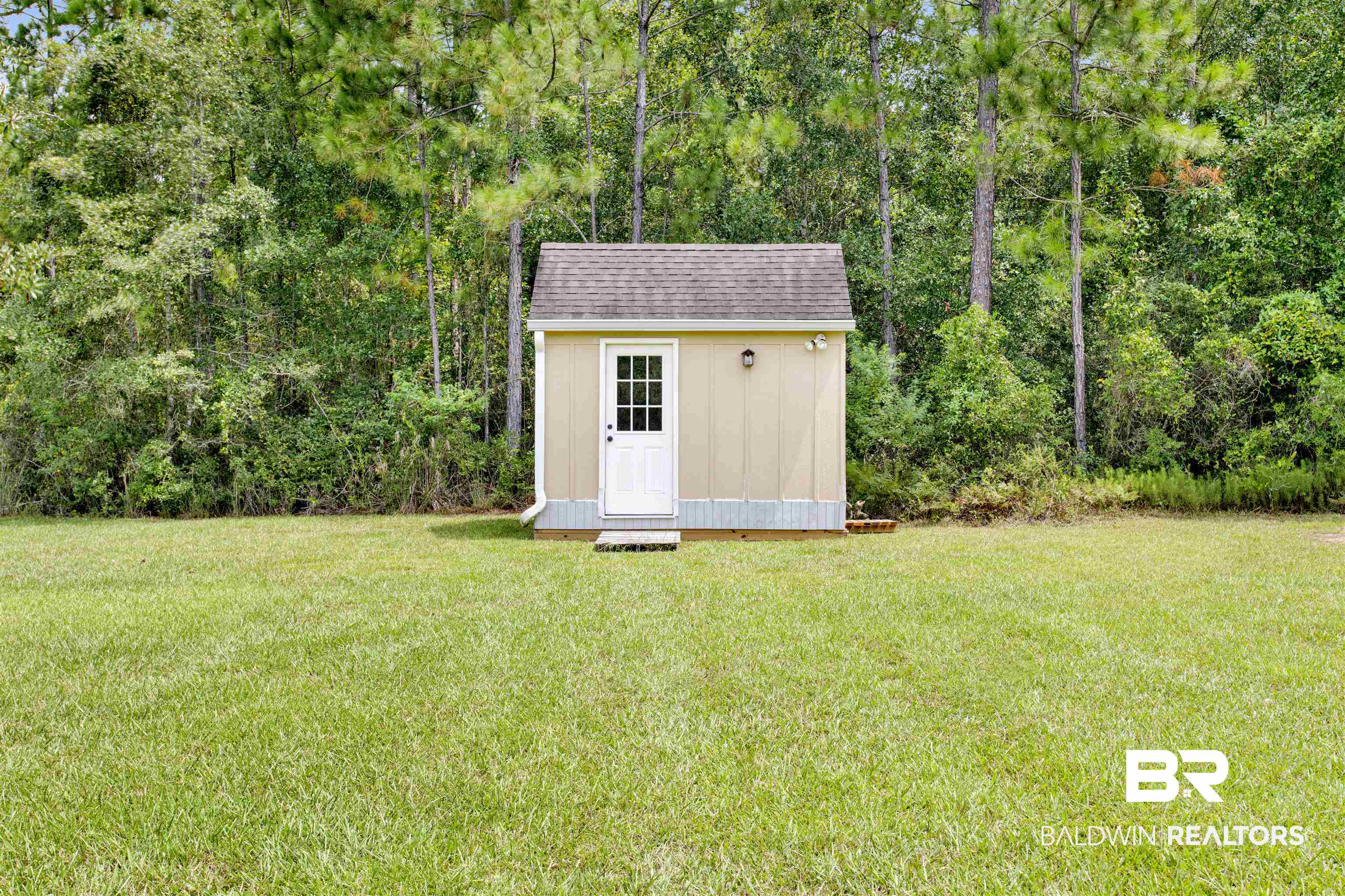 9240 Bay Point Drive Elberta, AL 36530 - Photo 3 of 22 View of outdoor structure with a lawn