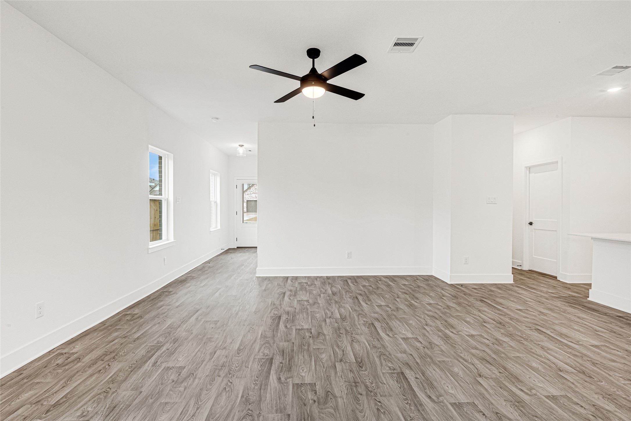 9460 Hard Rock Road Conroe, TX 77303 - Photo 9 of 28 Living Area view form Dining Area