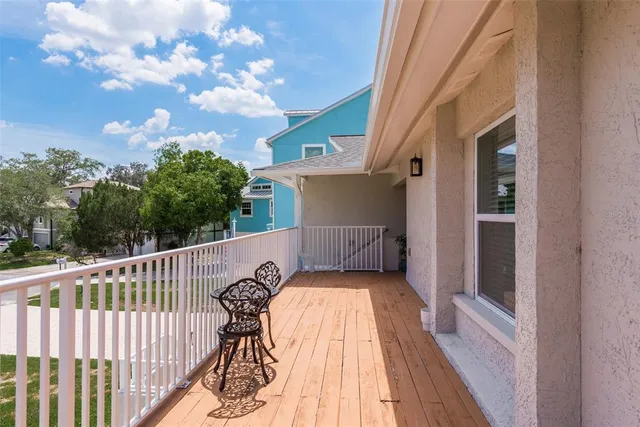 a balcony view with a garden