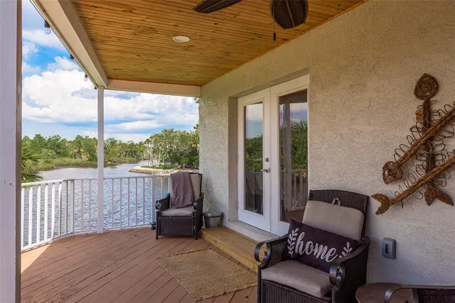 a balcony with furniture and a garden