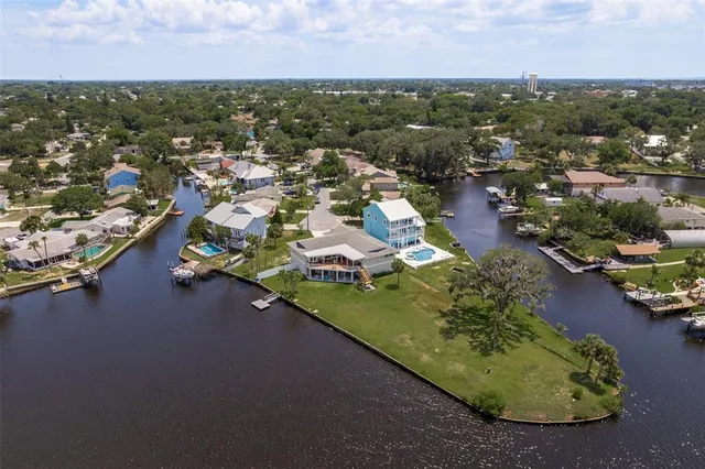 an aerial view of a houses with outdoor space