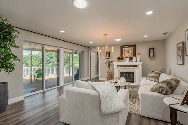 a large bedroom with a large bed and a large window