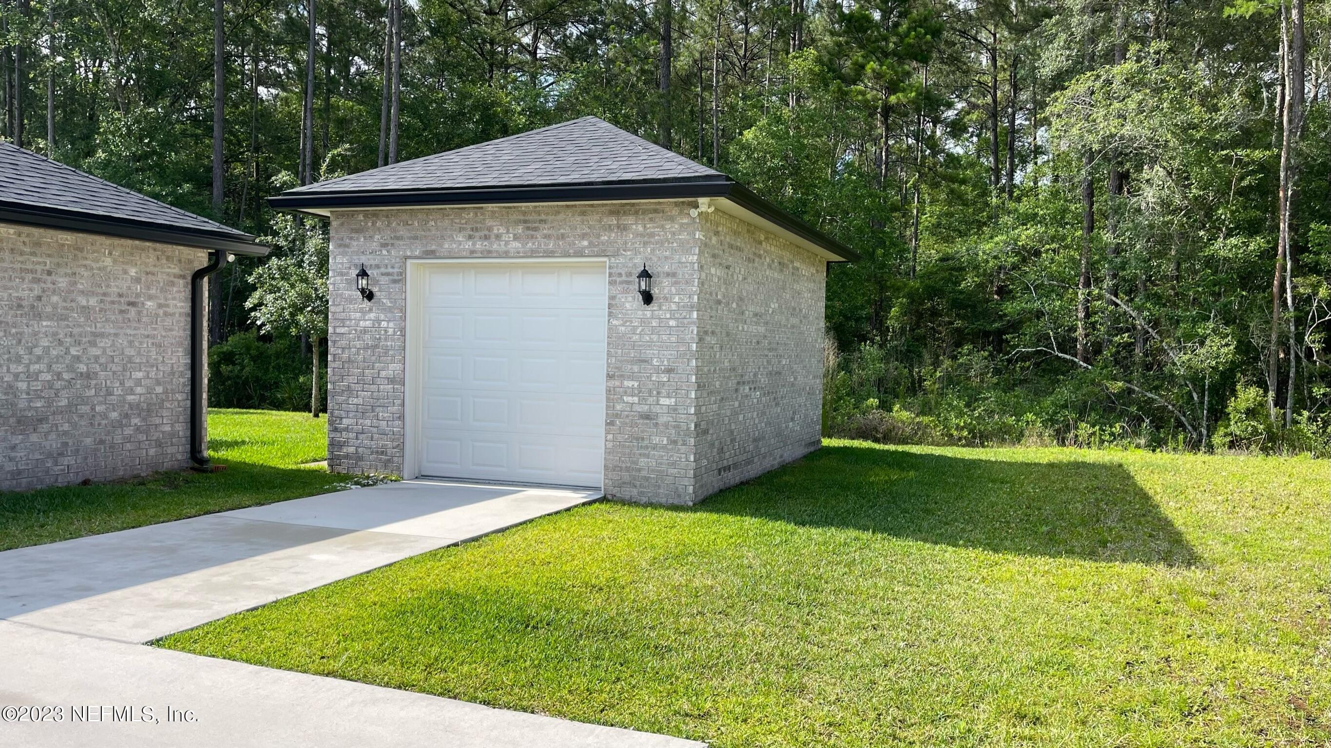 10913 Lothmore Road Jacksonville, FL 32221 - Photo 26 of 29 Workshop/4th Garage Bay