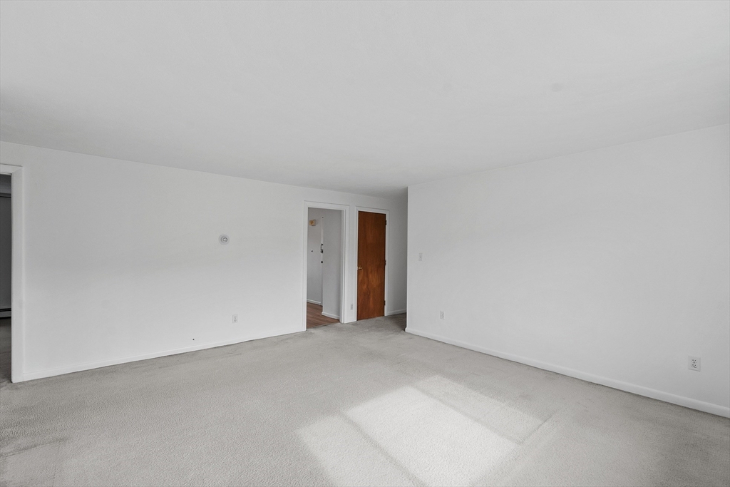 26 Bryon Road, Unit 3 Boston, MA 02467 - Photo 11 of 30 a view of an empty room