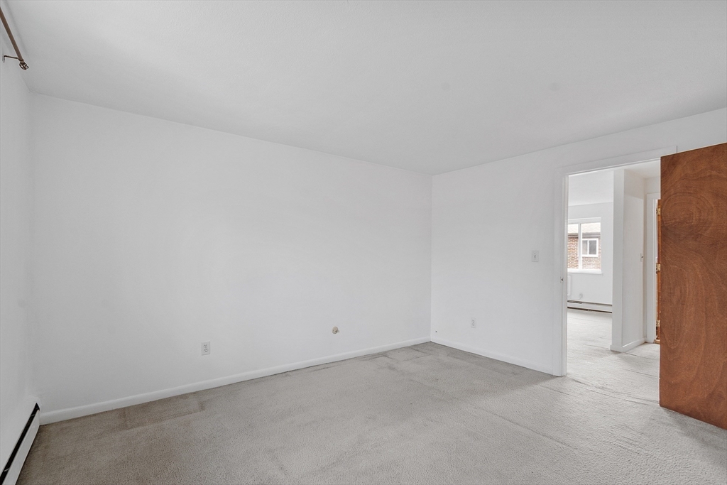 26 Bryon Road, Unit 3 Boston, MA 02467 - Photo 14 of 30 a view of an empty room
