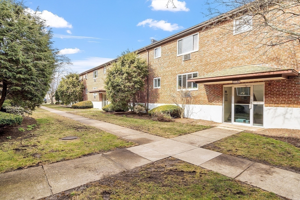 26 Bryon Road, Unit 3 Boston, MA 02467 - Photo 20 of 30 a view of a house with snow on the side of the road