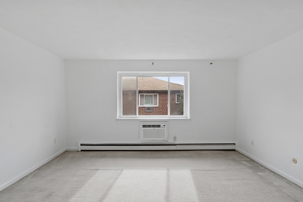 26 Bryon Road, Unit 3 Boston, MA 02467 - Photo 9 of 30 a view of a room with window