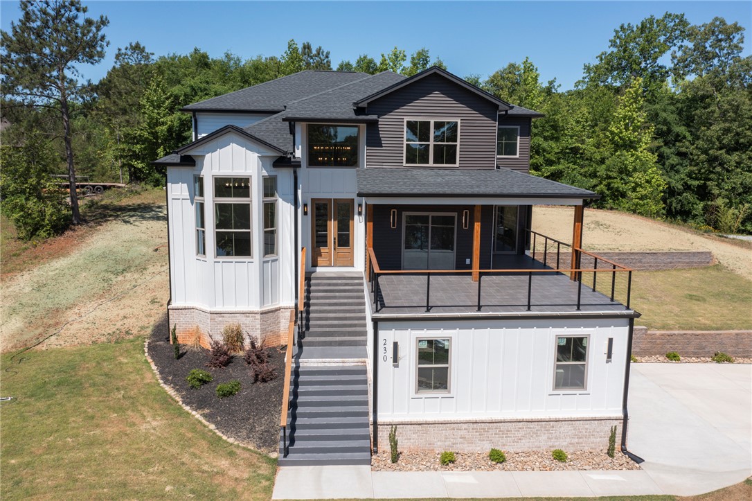 230 Hammond Circle Anderson, SC 29621 - Photo 3 of 48 This newly built home features a striking modern facade with ample outdoor living space.