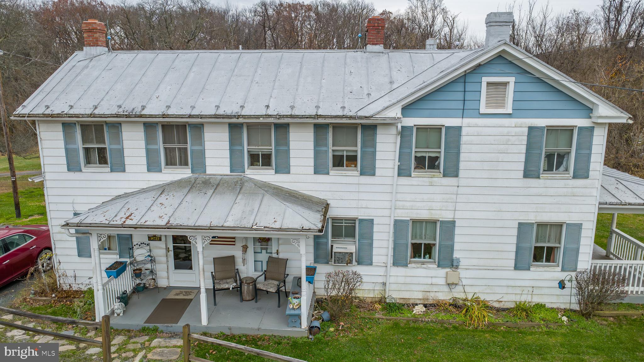 14735 Montresor Road Leesburg, VA 20176 - Photo 11 of 46 a view of a house with a yard porch and furniture