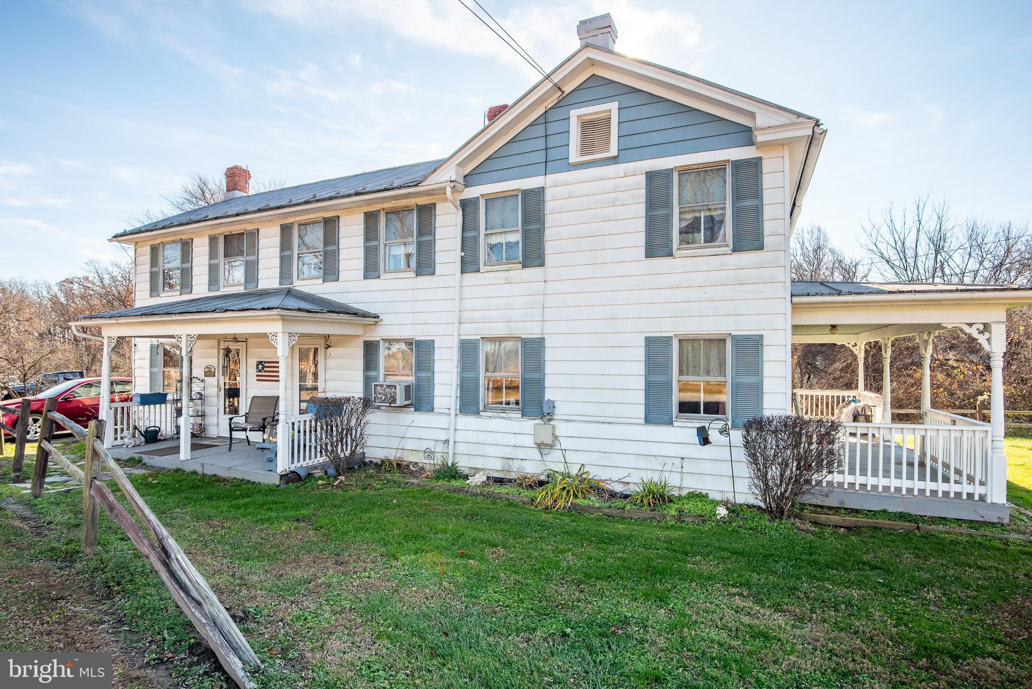14735 Montresor Road Leesburg, VA 20176 - Photo 12 of 46 a front view of a house with a yard