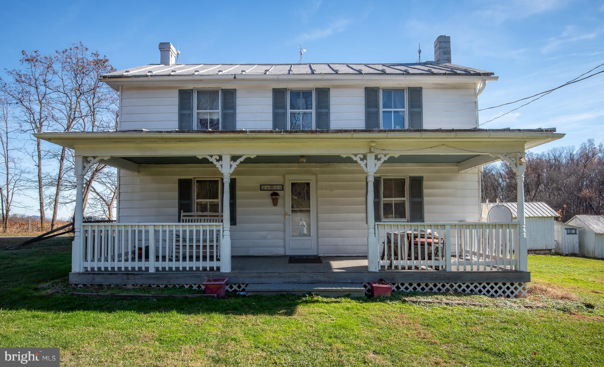 14735 Montresor Road Leesburg, VA 20176 - Photo 14 of 46 a front view of a house with a yard