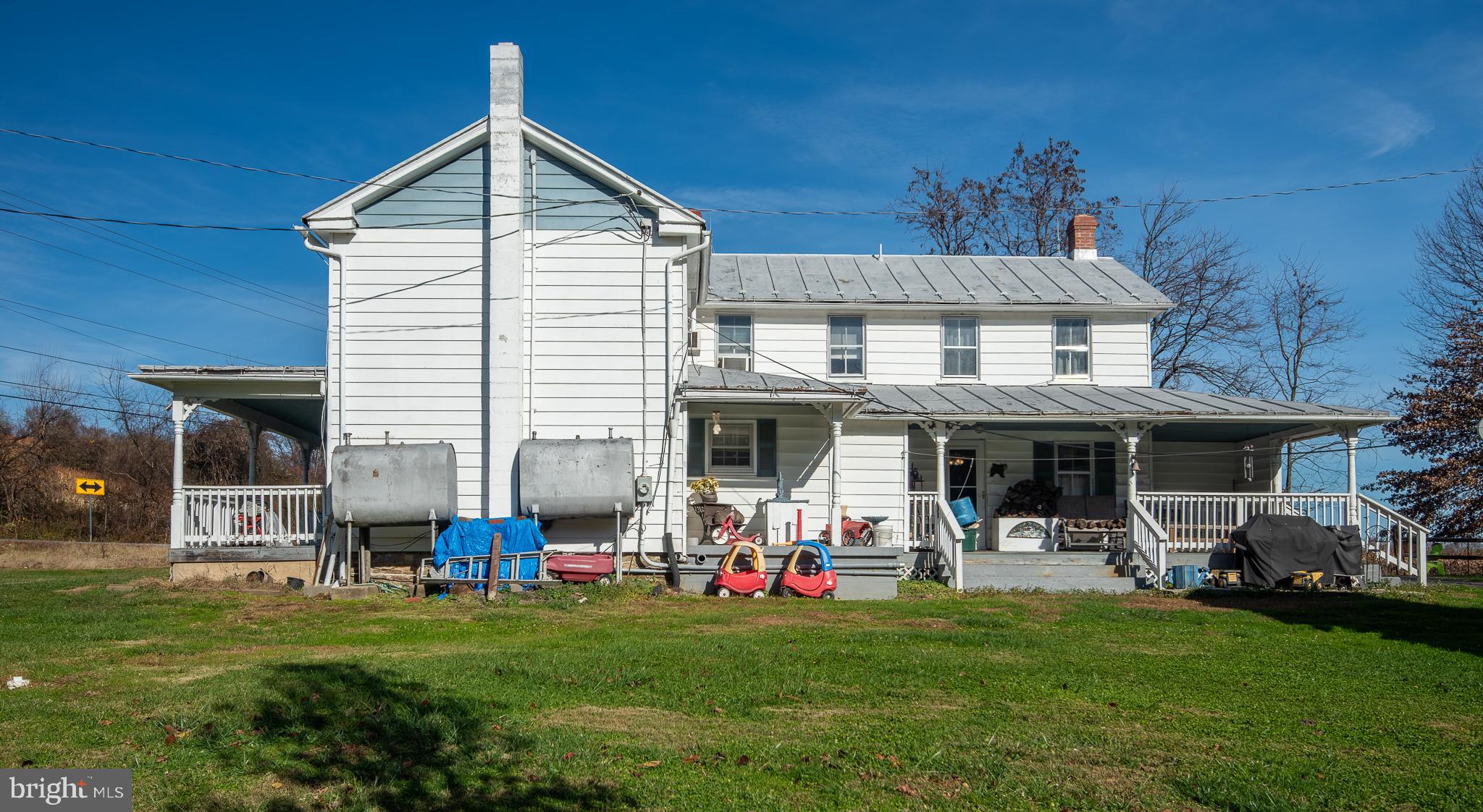 14735 Montresor Road Leesburg, VA 20176 - Photo 15 of 46 a view of a house with a yard and sitting area