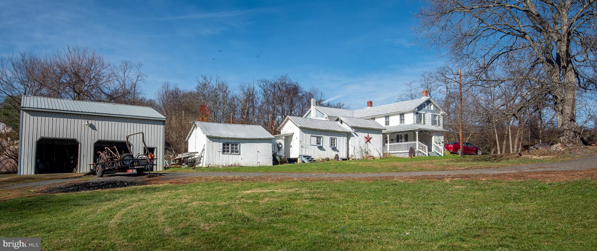 14735 Montresor Road Leesburg, VA 20176 - Photo 16 of 46 a view of a house with a yard