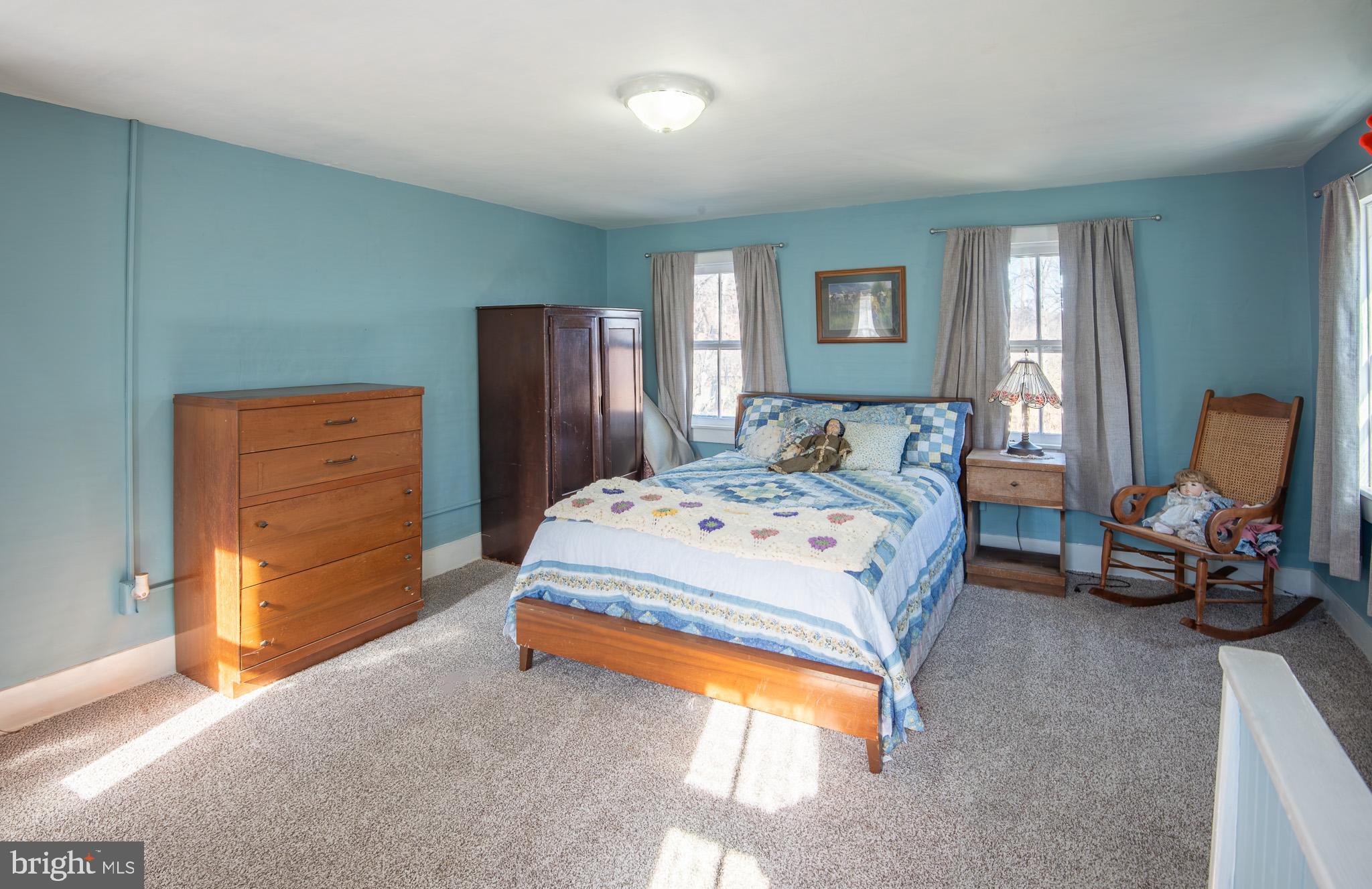 14735 Montresor Road Leesburg, VA 20176 - Photo 19 of 46 a bedroom with bed and window