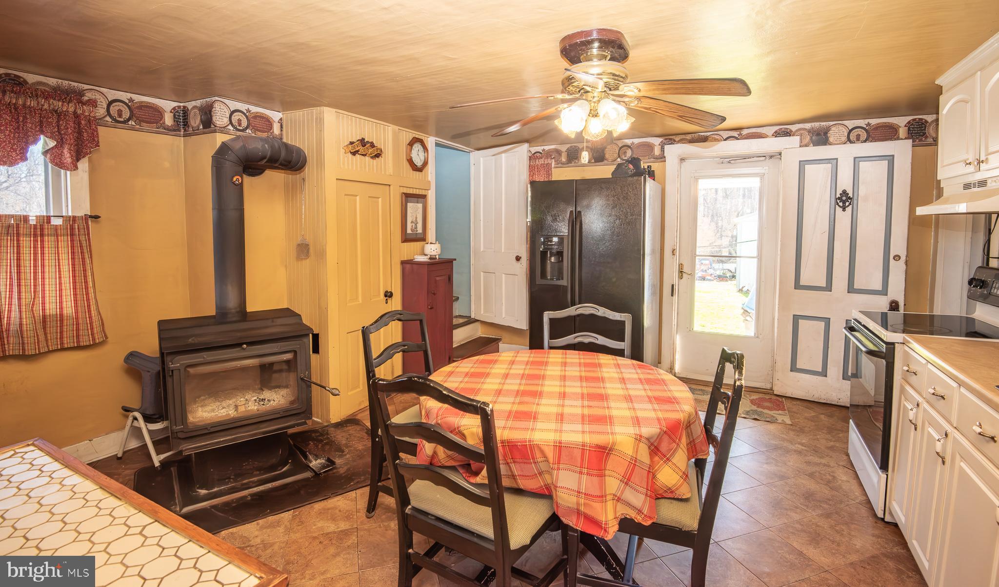 14735 Montresor Road Leesburg, VA 20176 - Photo 2 of 46 a dining room with furniture and window