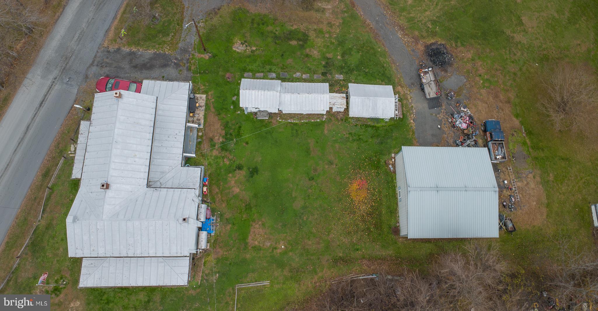 14735 Montresor Road Leesburg, VA 20176 - Photo 40 of 46 an aerial view of a house with a yard