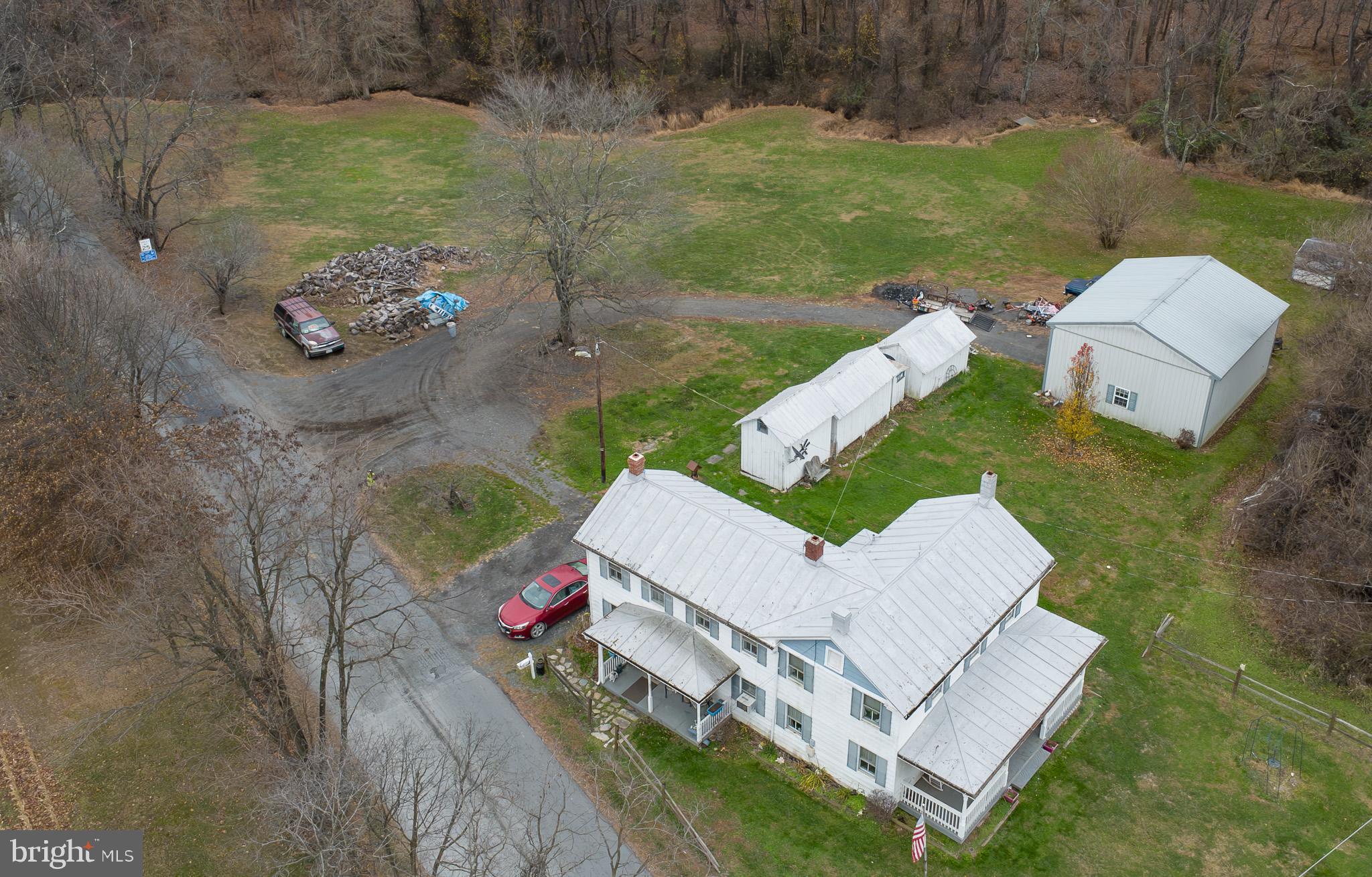 14735 Montresor Road Leesburg, VA 20176 - Photo 42 of 46 an aerial view of a house with a yard