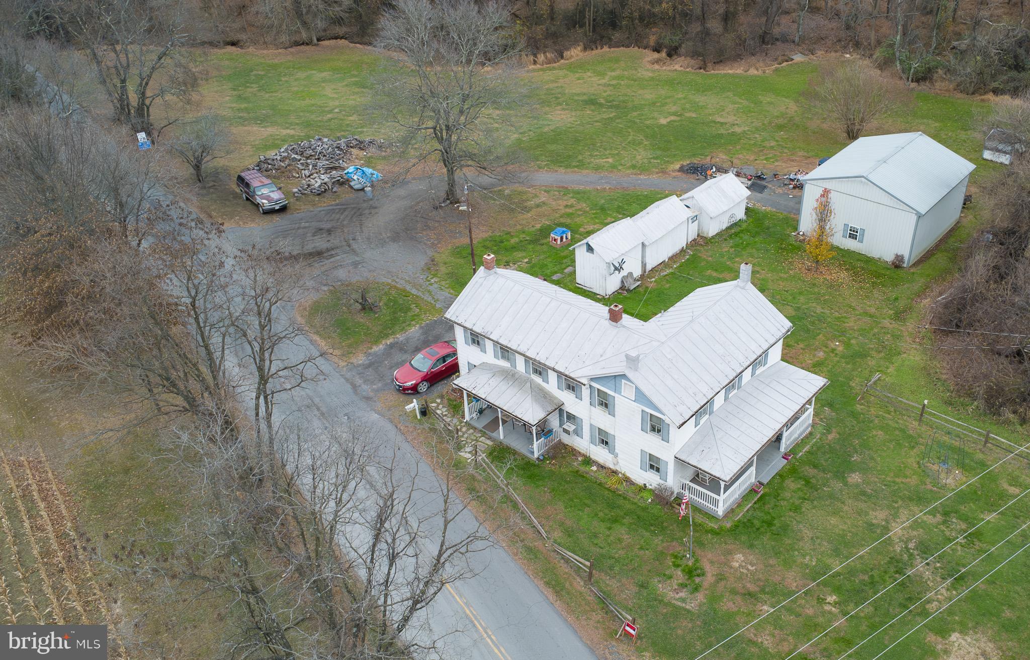 14735 Montresor Road Leesburg, VA 20176 - Photo 43 of 46 an aerial view of a house with a yard