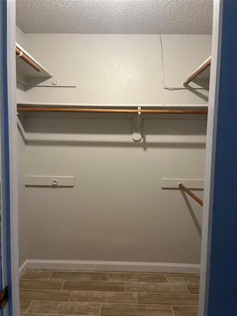 a view of small space with racks on the wall