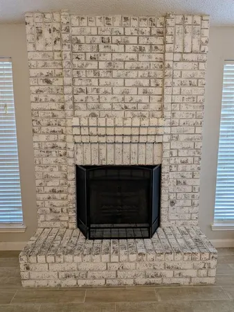a room with a fireplace