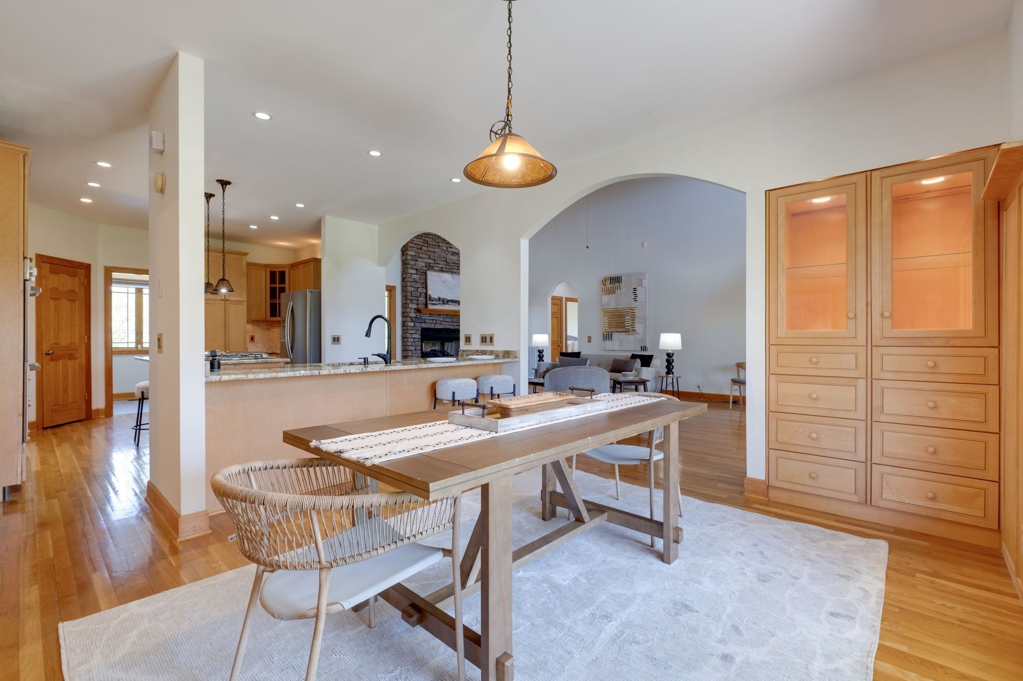 1249 White Road Bon Aqua, TN 37025 - Photo 20 of 60 a room with stainless steel appliances kitchen island a table and chairs in it