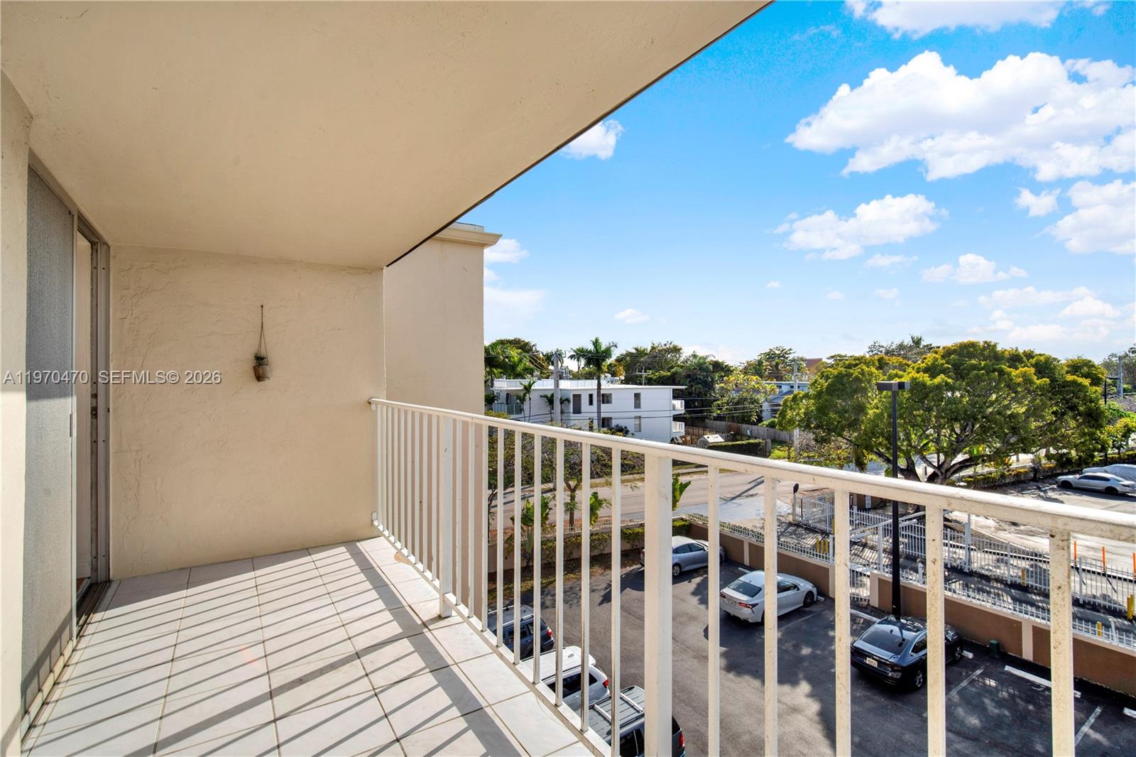 7747 Southwest 86th Street, Unit D403 Miami, FL 33143 - Photo 17 of 25 a view of a balcony with an outdoor space