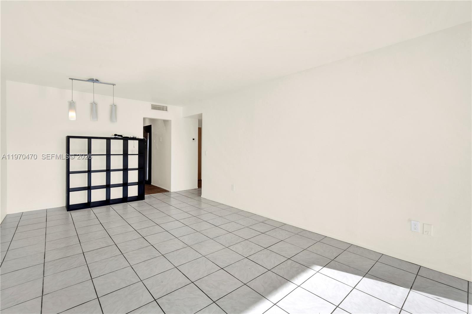 7747 Southwest 86th Street, Unit D403 Miami, FL 33143 - Photo 7 of 25 a view of an empty room
