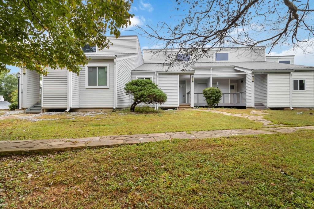 a view of a house with a swimming pool